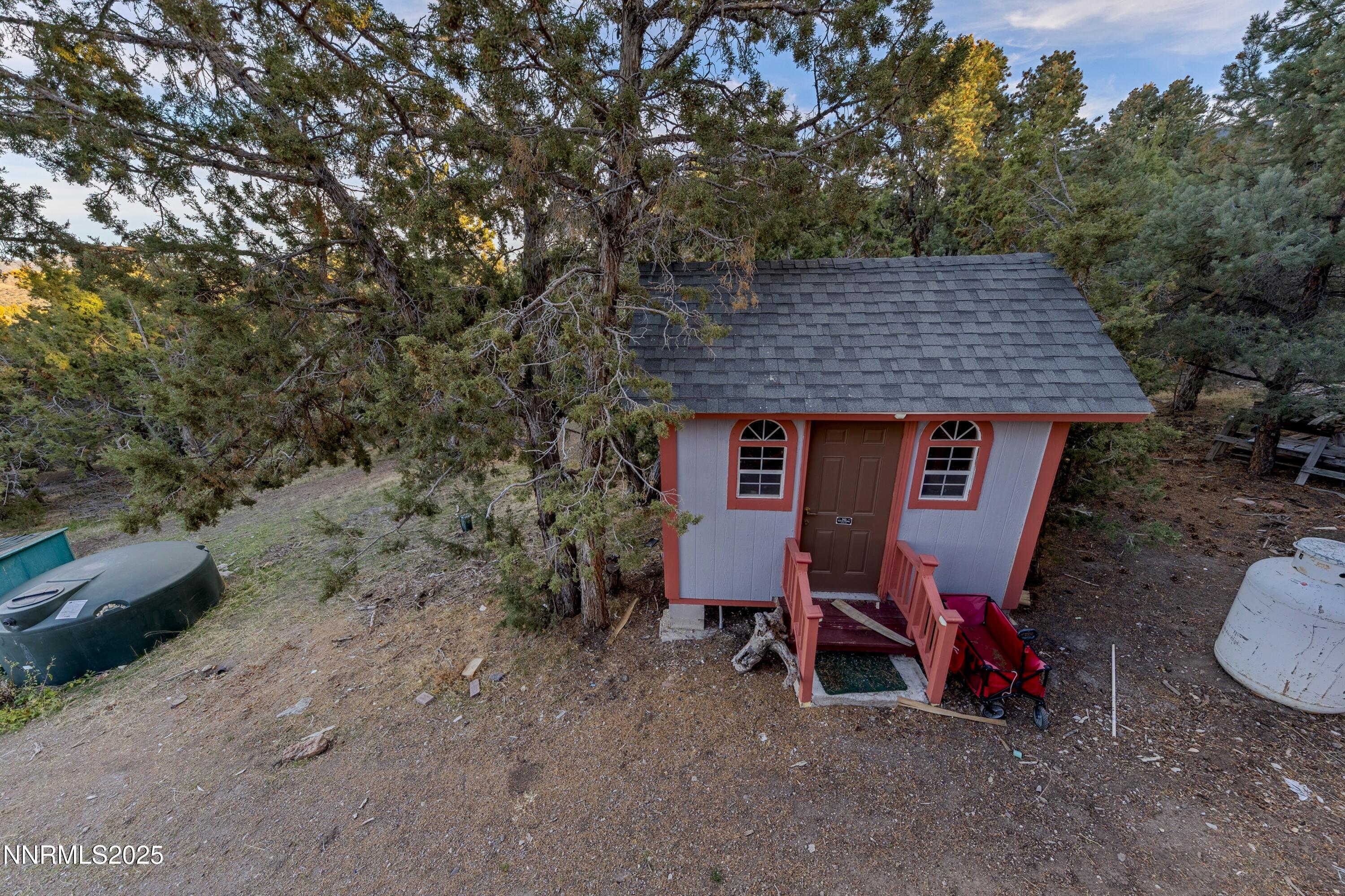 21565 Dortort Drive Reno, NV 89521 - Photo 25 of 25 a backyard of a house with table and chairs