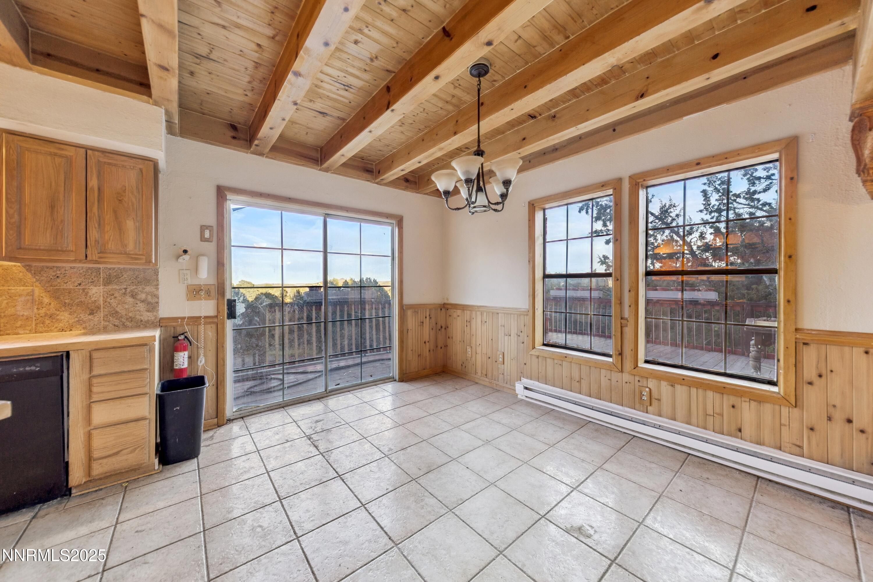 21565 Dortort Drive Reno, NV 89521 - Photo 7 of 25 a view of empty room with windows