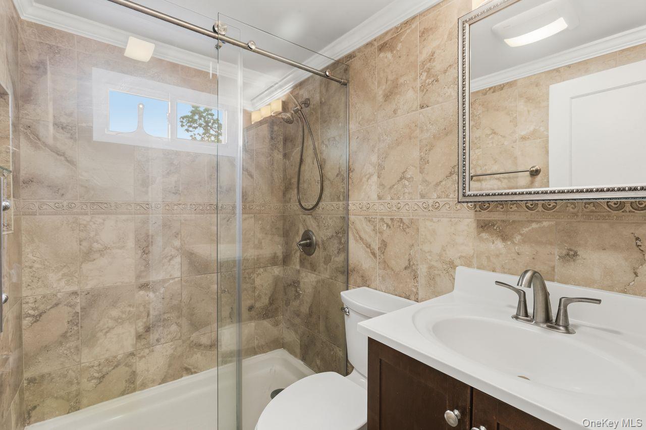 5 Adair Road Cortlandt Manor, NY 10567 - Photo 17 of 36 First floor bathroom with heated floors