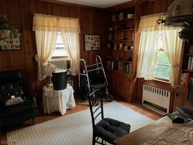 a view of a livingroom with furniture and windows