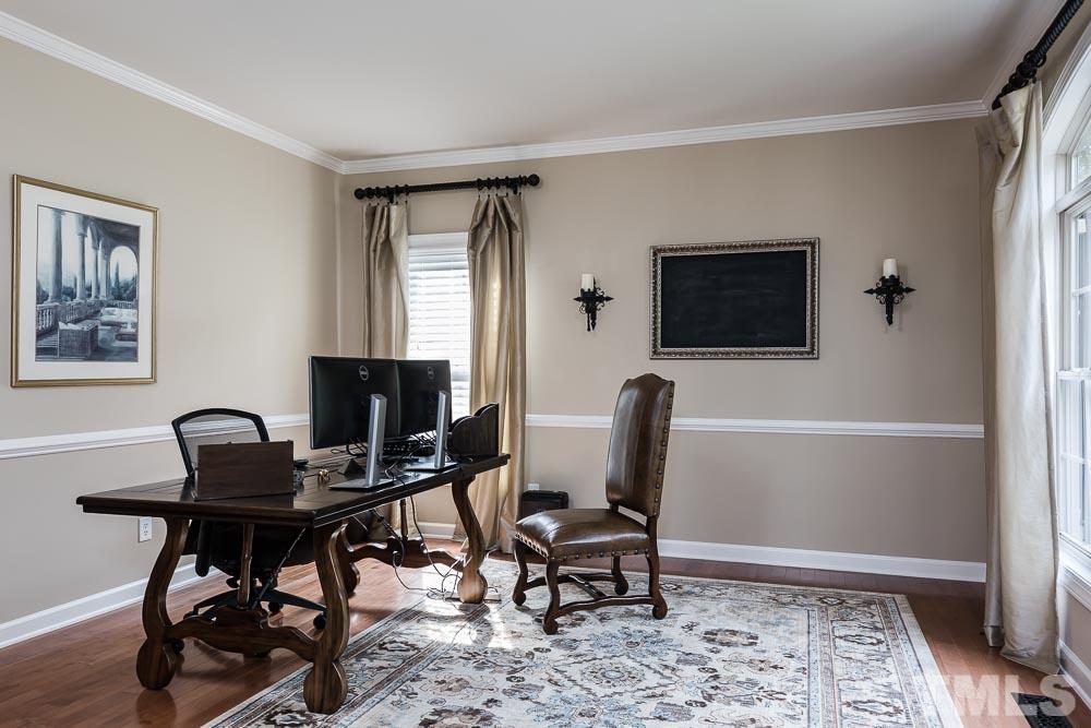 8236 Clarks Branch Drive Raleigh, NC 27613 - Photo 14 of 25 a view of a workspace with furniture and a window