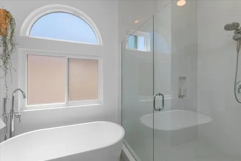 a bathroom with a sink and a bathtub