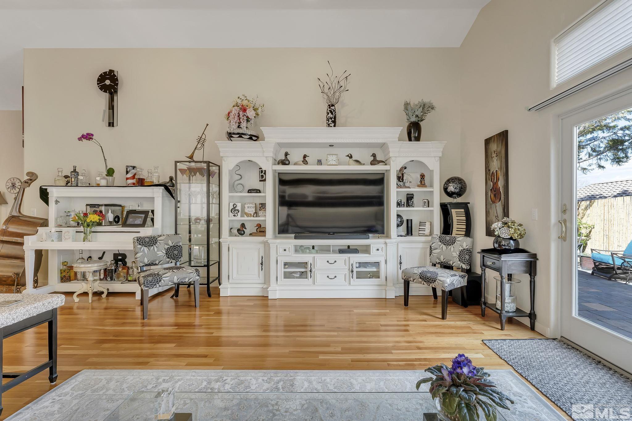 2560 Granite Springs Road Reno, NV 89519 - Photo 11 of 33 a living room with furniture and a flat screen tv