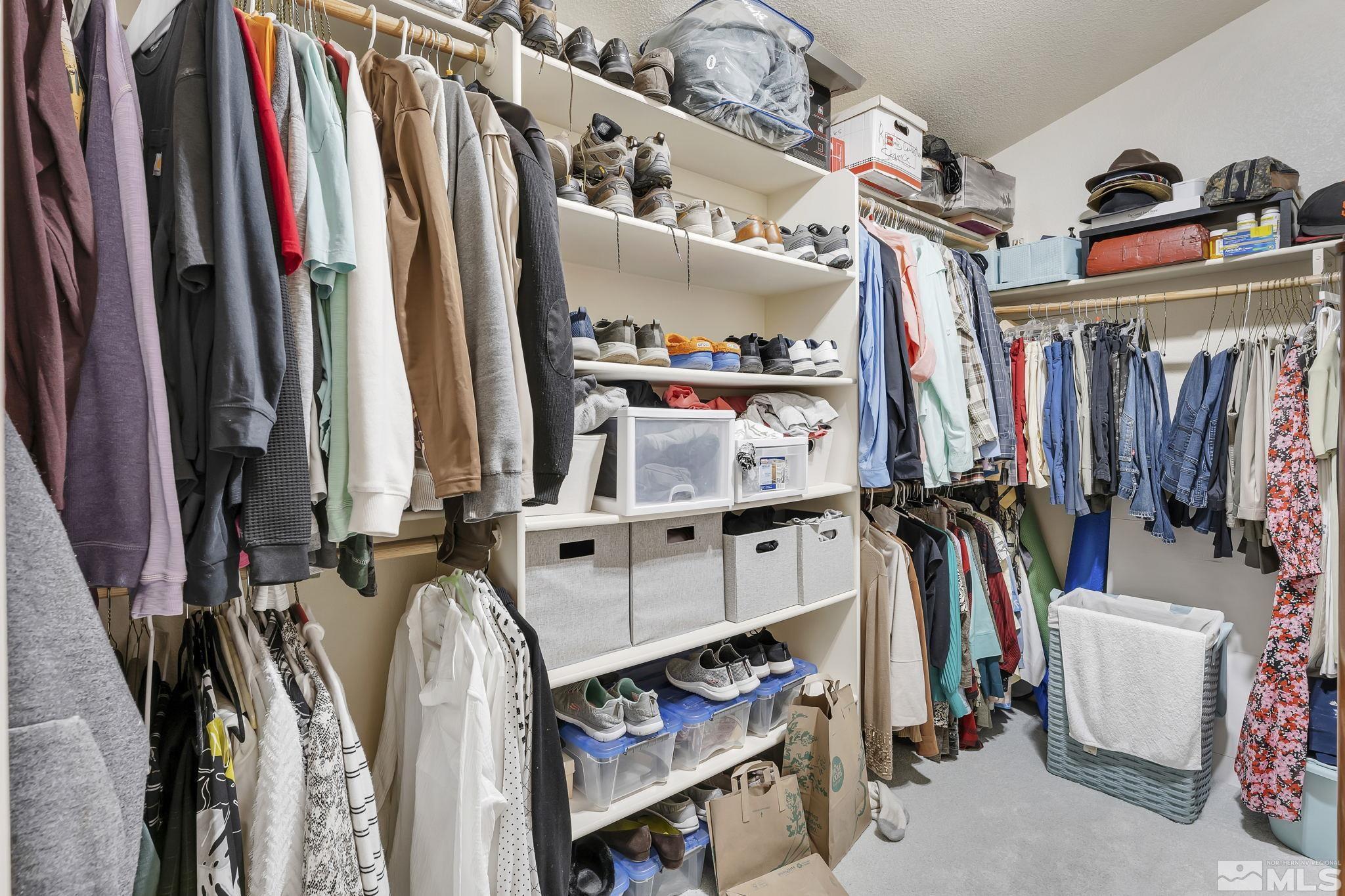2560 Granite Springs Road Reno, NV 89519 - Photo 19 of 33 a view of walk in closet with clothes and shoes