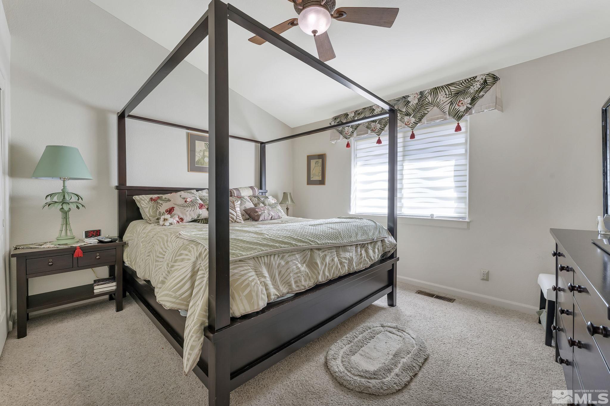 2560 Granite Springs Road Reno, NV 89519 - Photo 20 of 33 a bedroom with a bed and a window