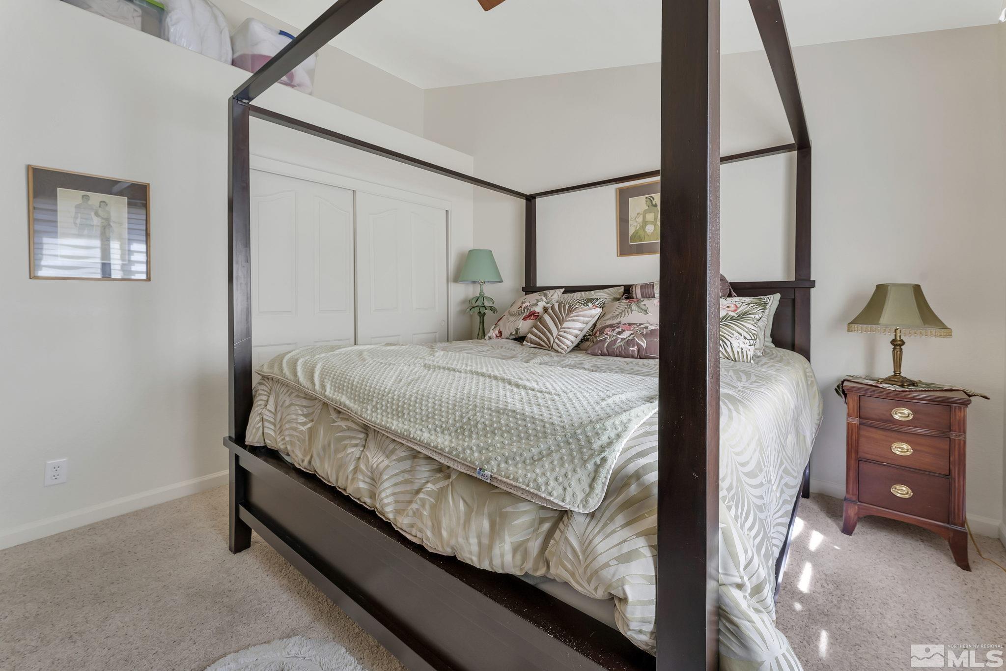 2560 Granite Springs Road Reno, NV 89519 - Photo 21 of 33 a bedroom with a bed window and a dresser