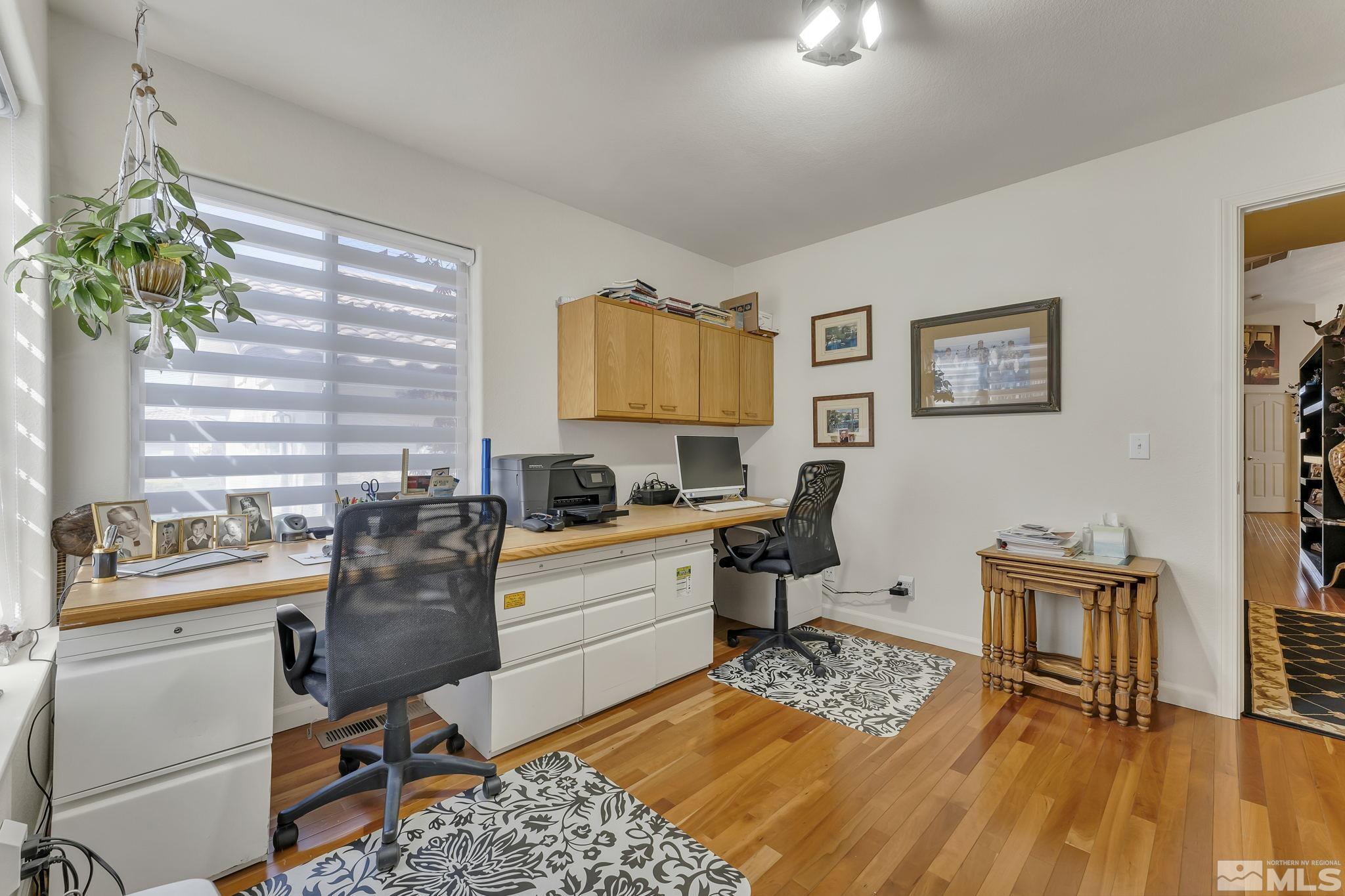 2560 Granite Springs Road Reno, NV 89519 - Photo 23 of 33 a view of a workspace with furniture and a window