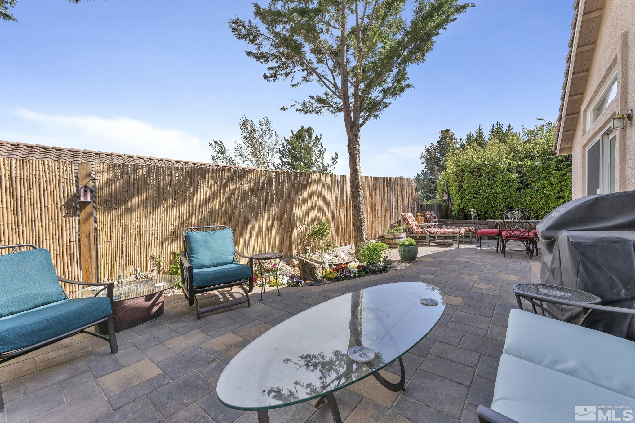 2560 Granite Springs Road Reno, NV 89519 - Photo 27 of 33 a backyard of a house with table and chairs