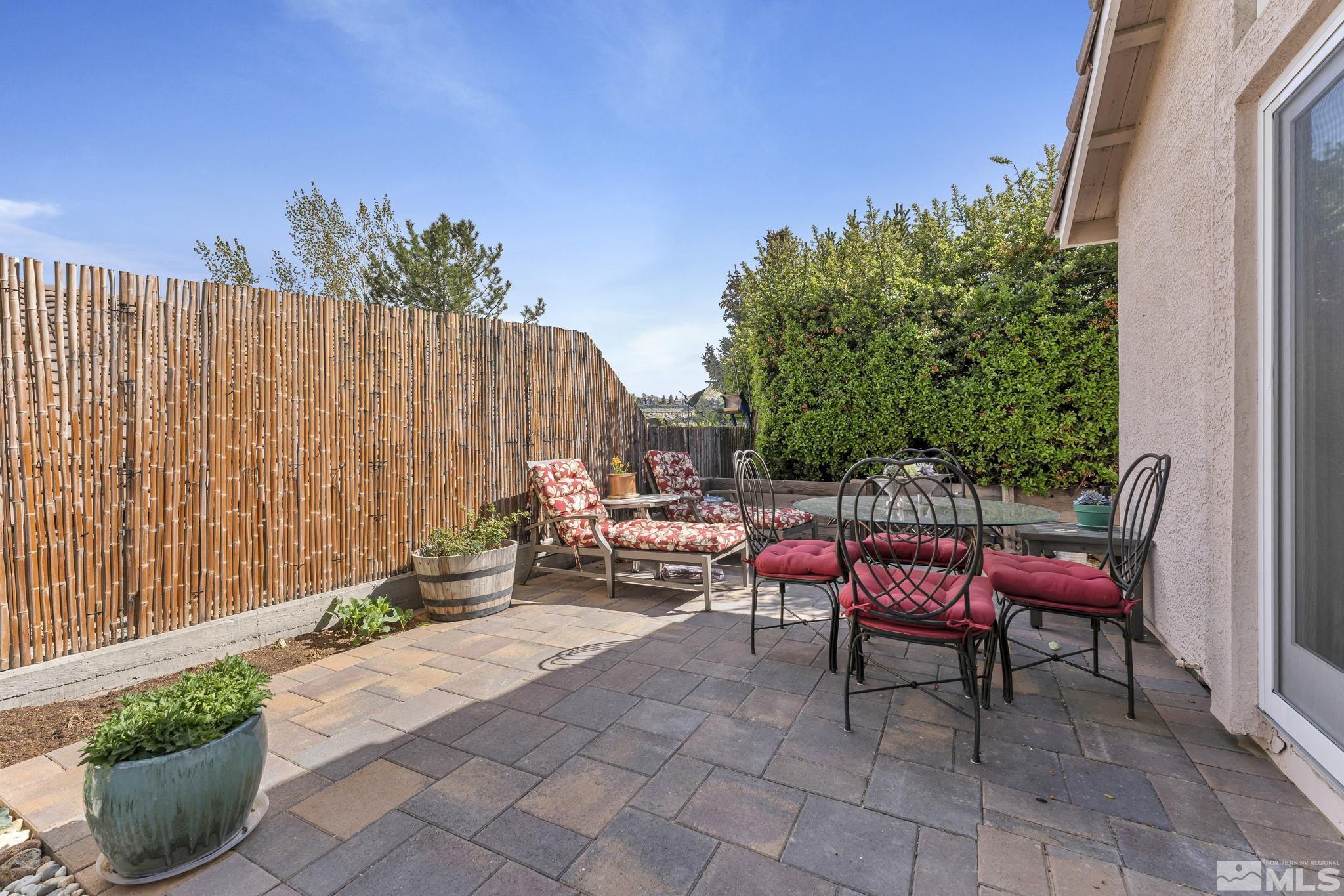 2560 Granite Springs Road Reno, NV 89519 - Photo 29 of 33 a backyard with a table and chairs
