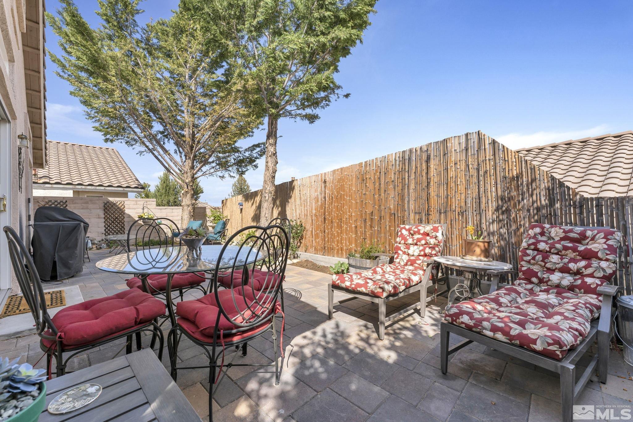 2560 Granite Springs Road Reno, NV 89519 - Photo 30 of 33 an outdoor sitting area with furniture and garden view