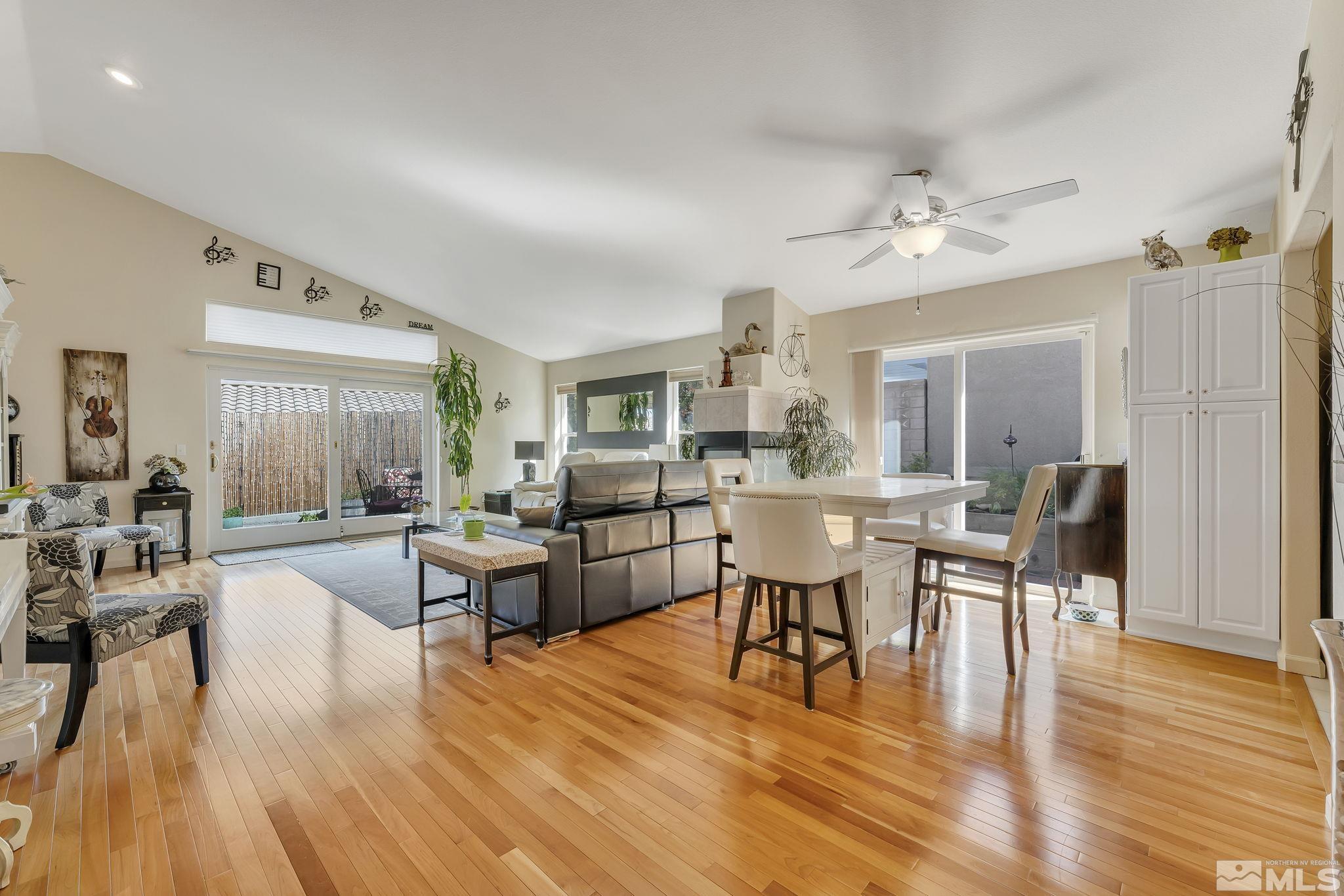 2560 Granite Springs Road Reno, NV 89519 - Photo 9 of 33 a view of a dining room with furniture and wooden floor
