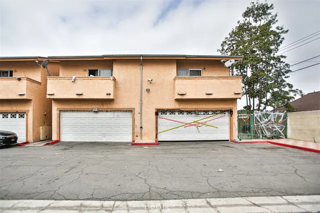 a front view of house with garage