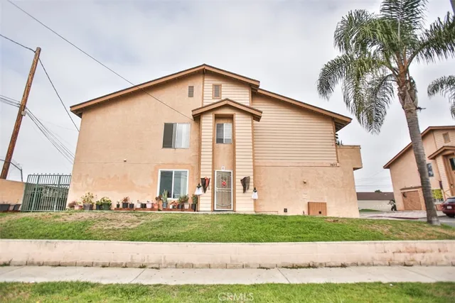 a view of entryway with furniture and wooden floor