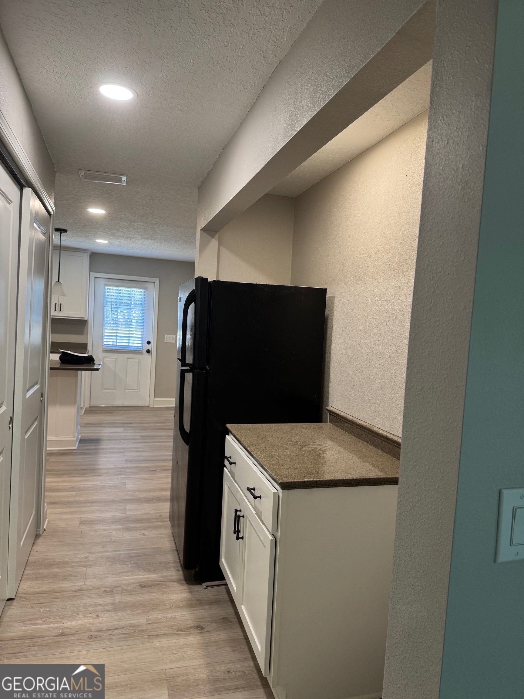 2199 Tom Crawford Road Hilliard, FL 32046 - Photo 11 of 18 a kitchen with a refrigerator and a refrigerator