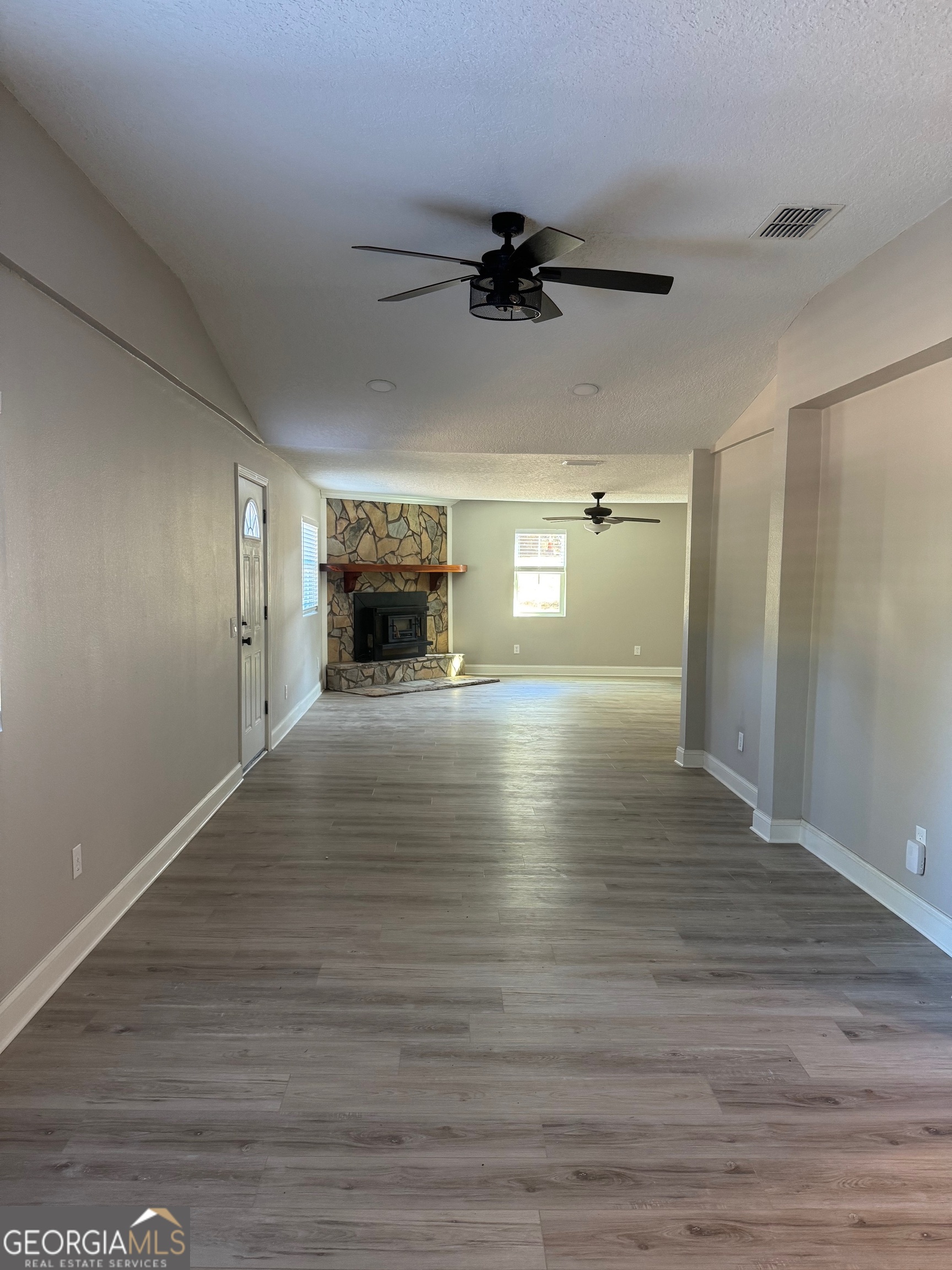 2199 Tom Crawford Road Hilliard, FL 32046 - Photo 12 of 18 a view of empty room with wooden floor