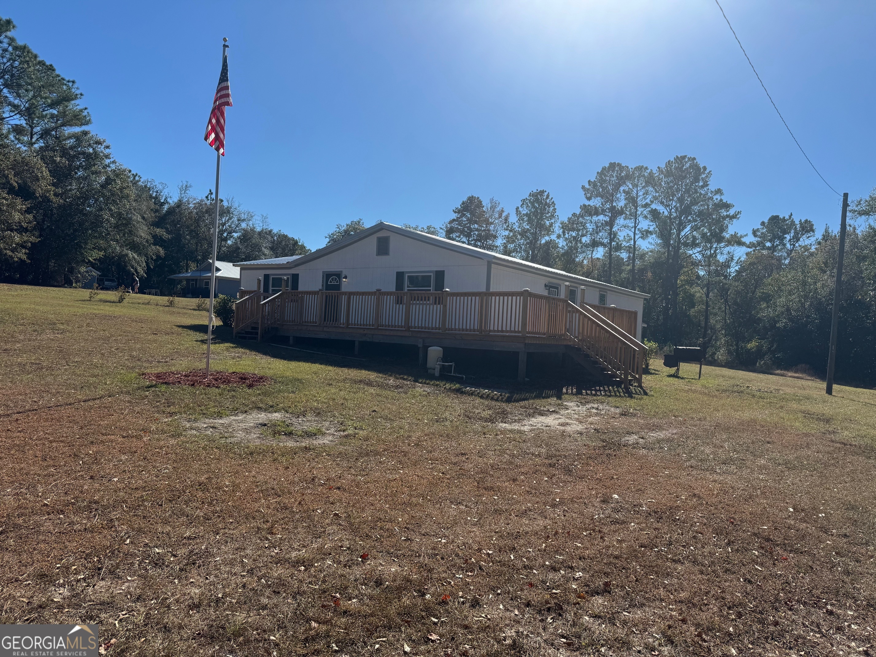 2199 Tom Crawford Road Hilliard, FL 32046 - Photo 2 of 18 a house view with a outdoor space