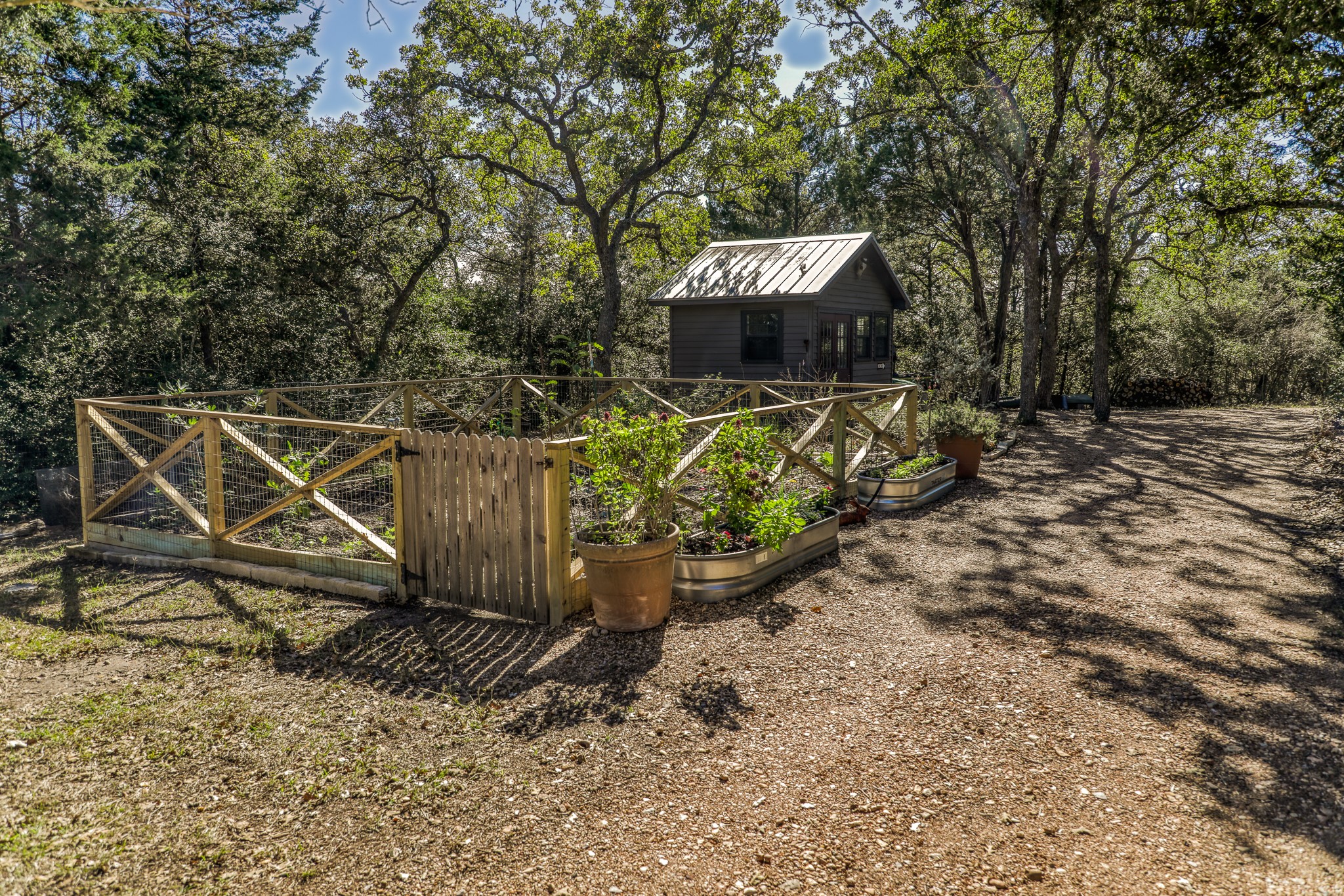 1745 Schoenberg Road Carmine, TX 78932 - Photo 25 of 30 a wooden bench sitting in a backyard