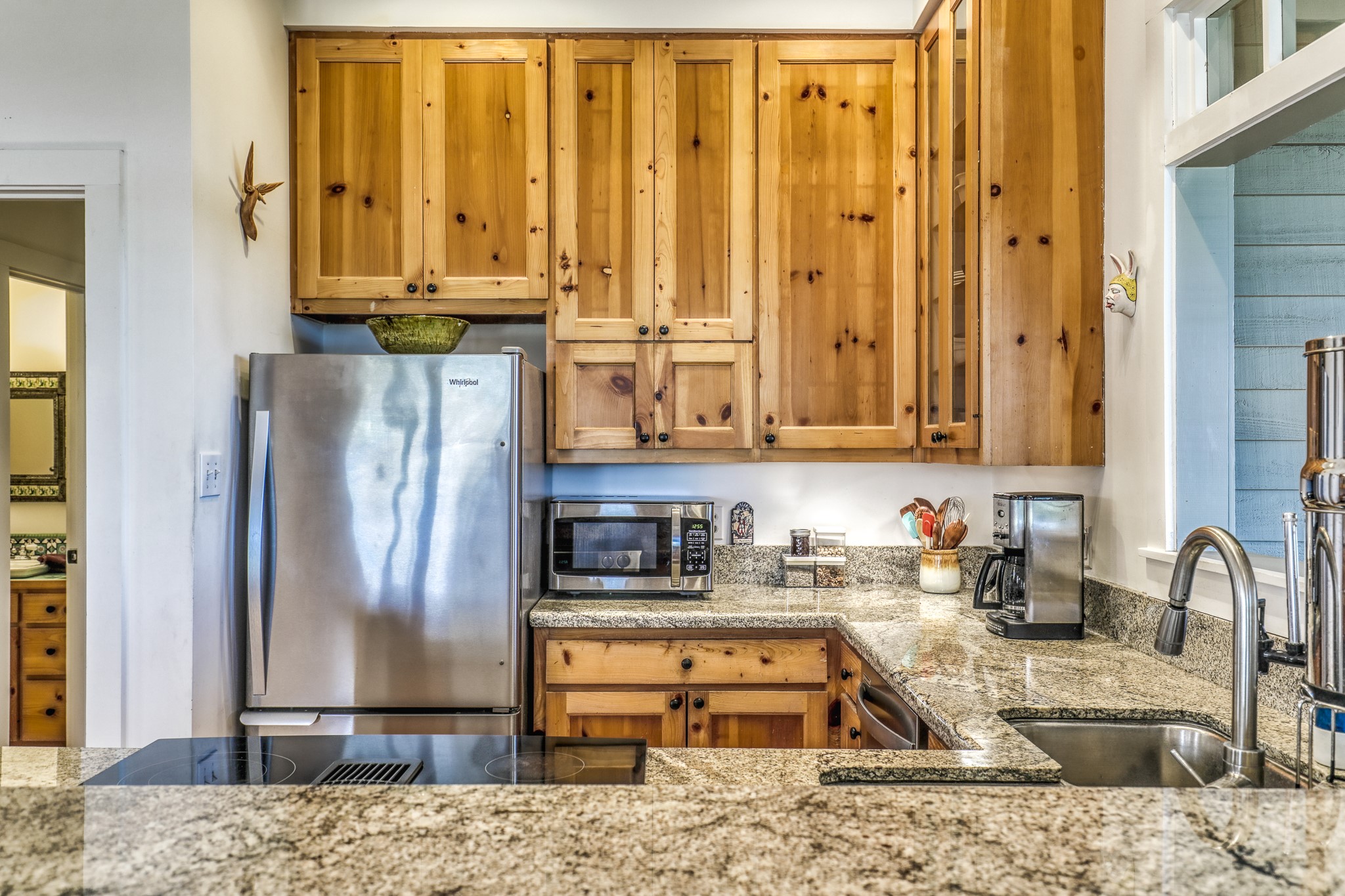 1745 Schoenberg Road Carmine, TX 78932 - Photo 7 of 30 a kitchen with stainless steel appliances granite countertop a refrigerator a stove and a sink