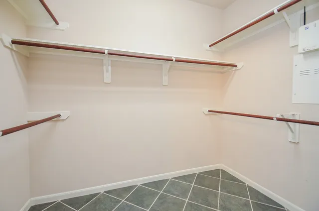 a white bath tub sitting next to a window