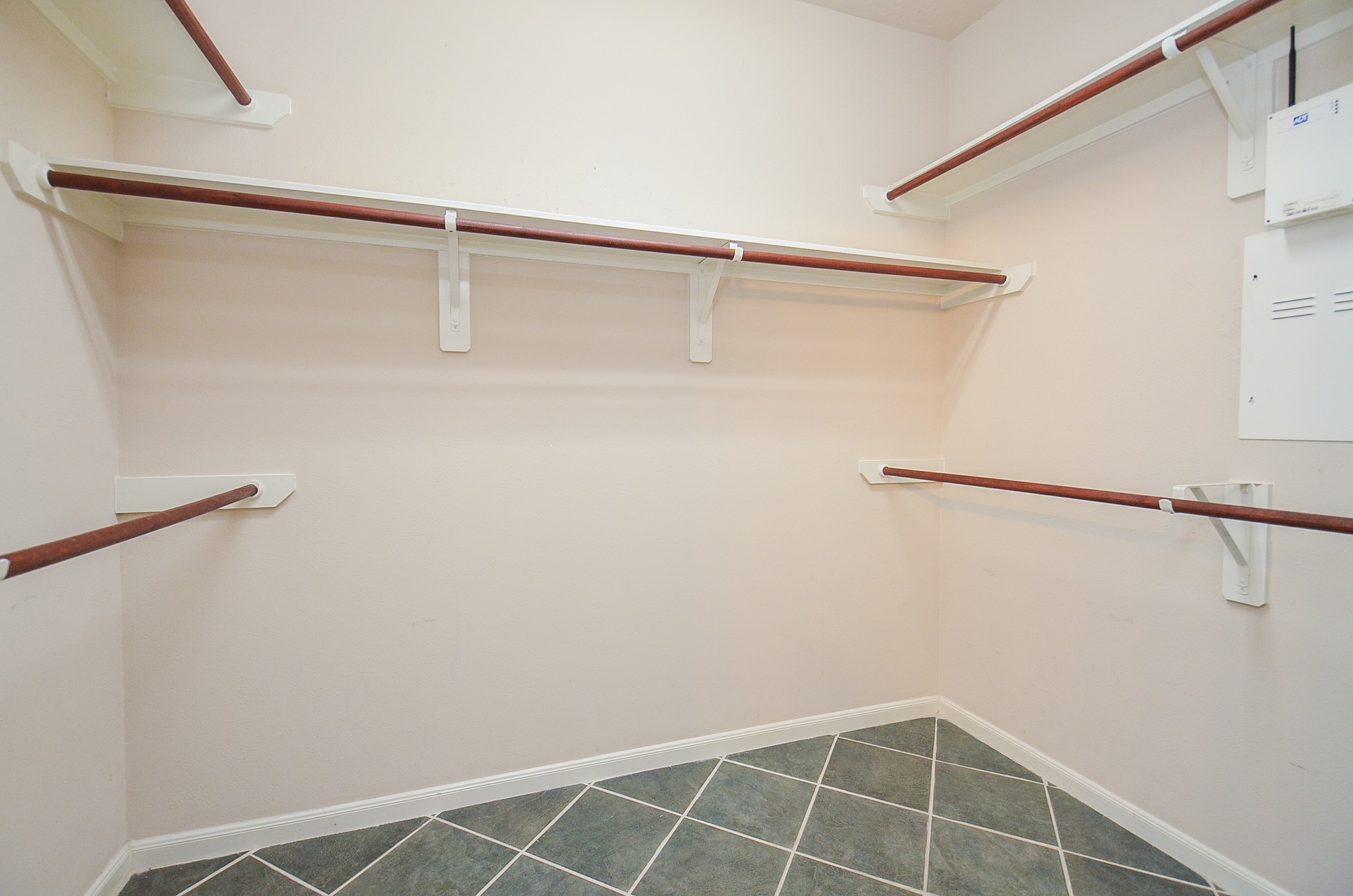 20127 Jasper Oaks Drive Cypress, TX 77433 - Photo 21 of 32 a view of a room with racks on the wall