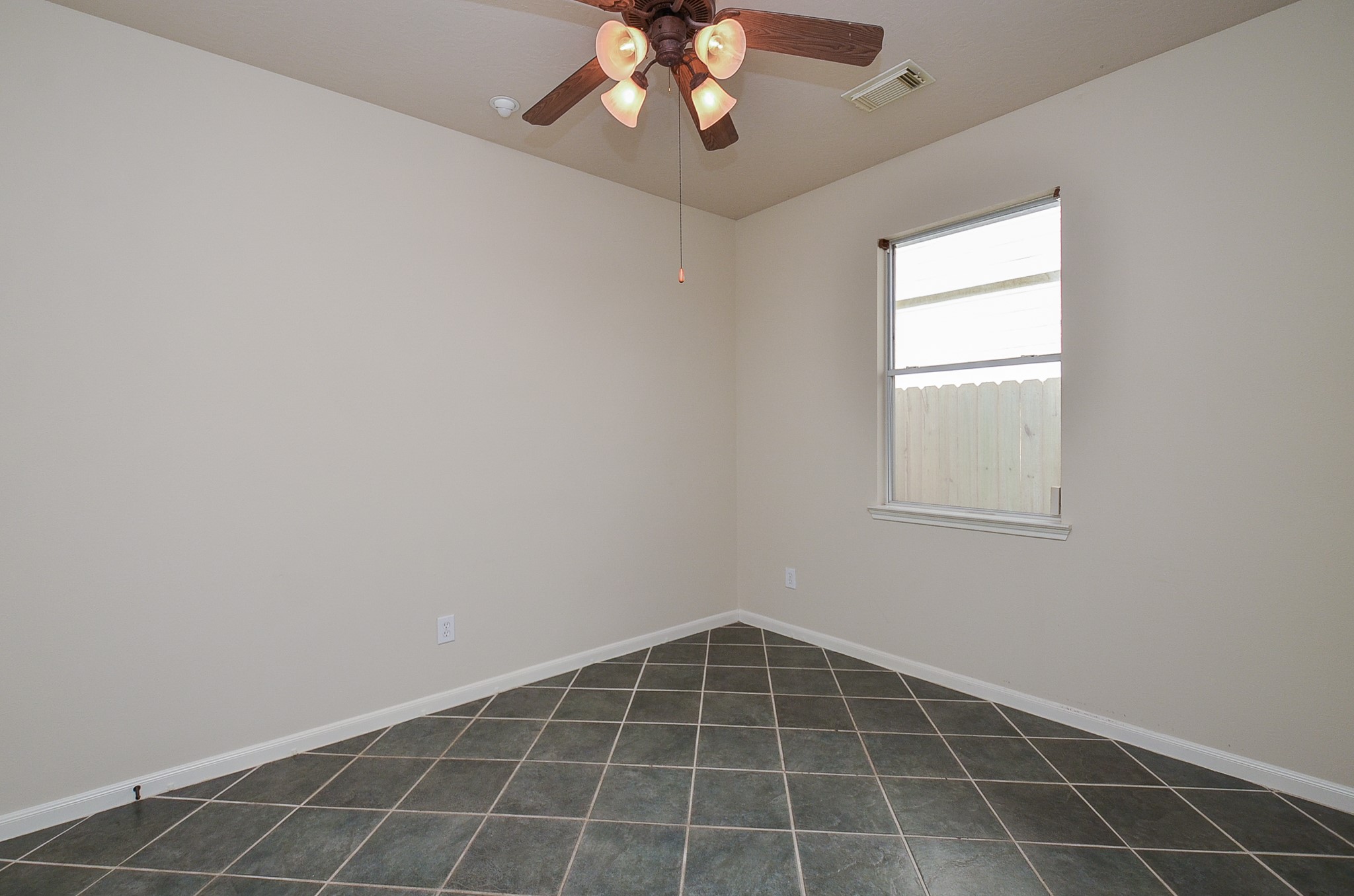 20127 Jasper Oaks Drive Cypress, TX 77433 - Photo 25 of 32 an empty room with a window
