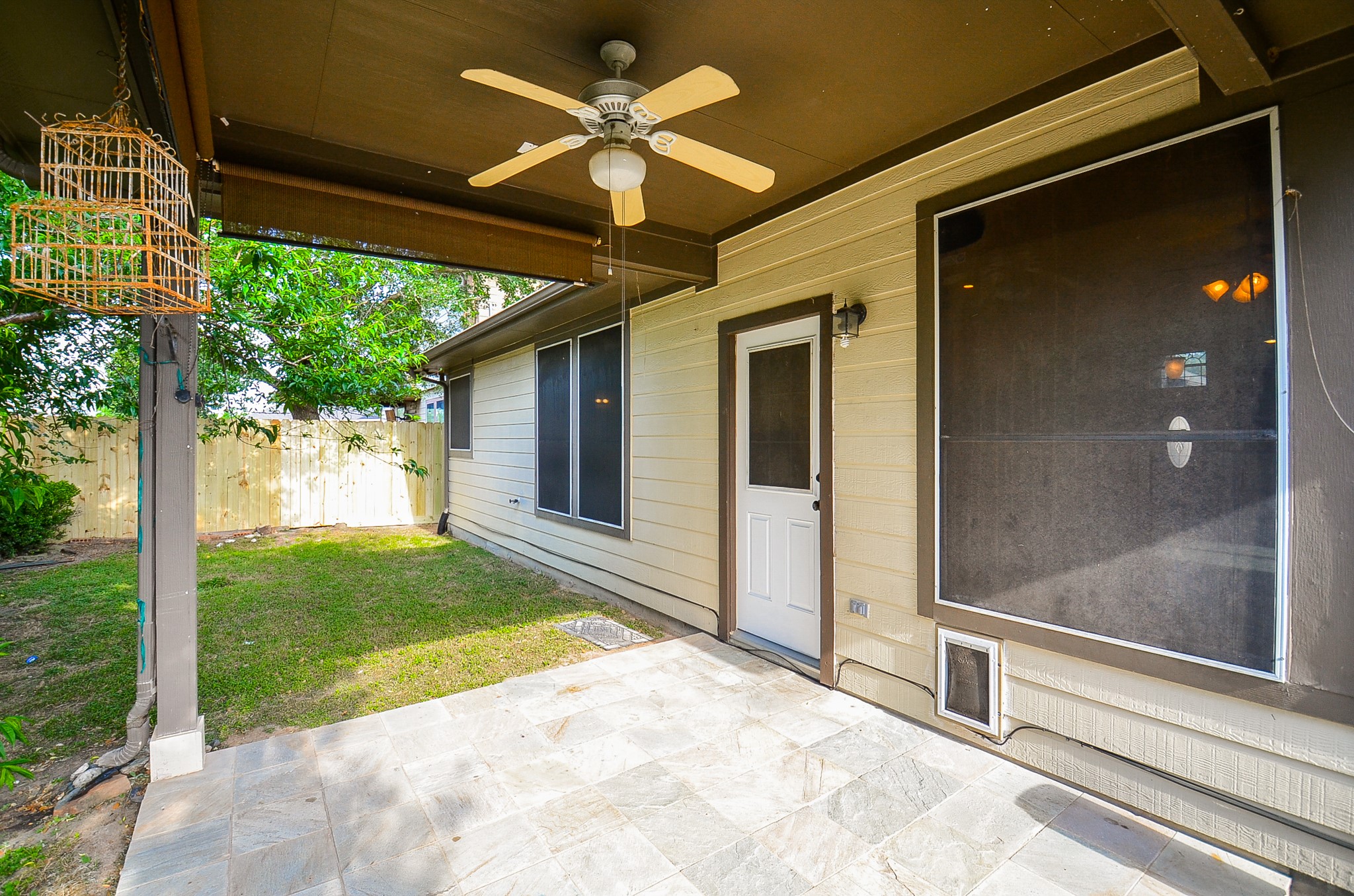 20127 Jasper Oaks Drive Cypress, TX 77433 - Photo 26 of 32 a view of a porch with a backyard