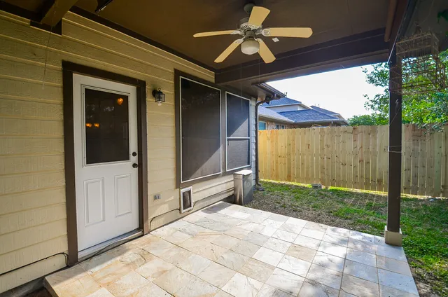 a view of a porch with a backyard