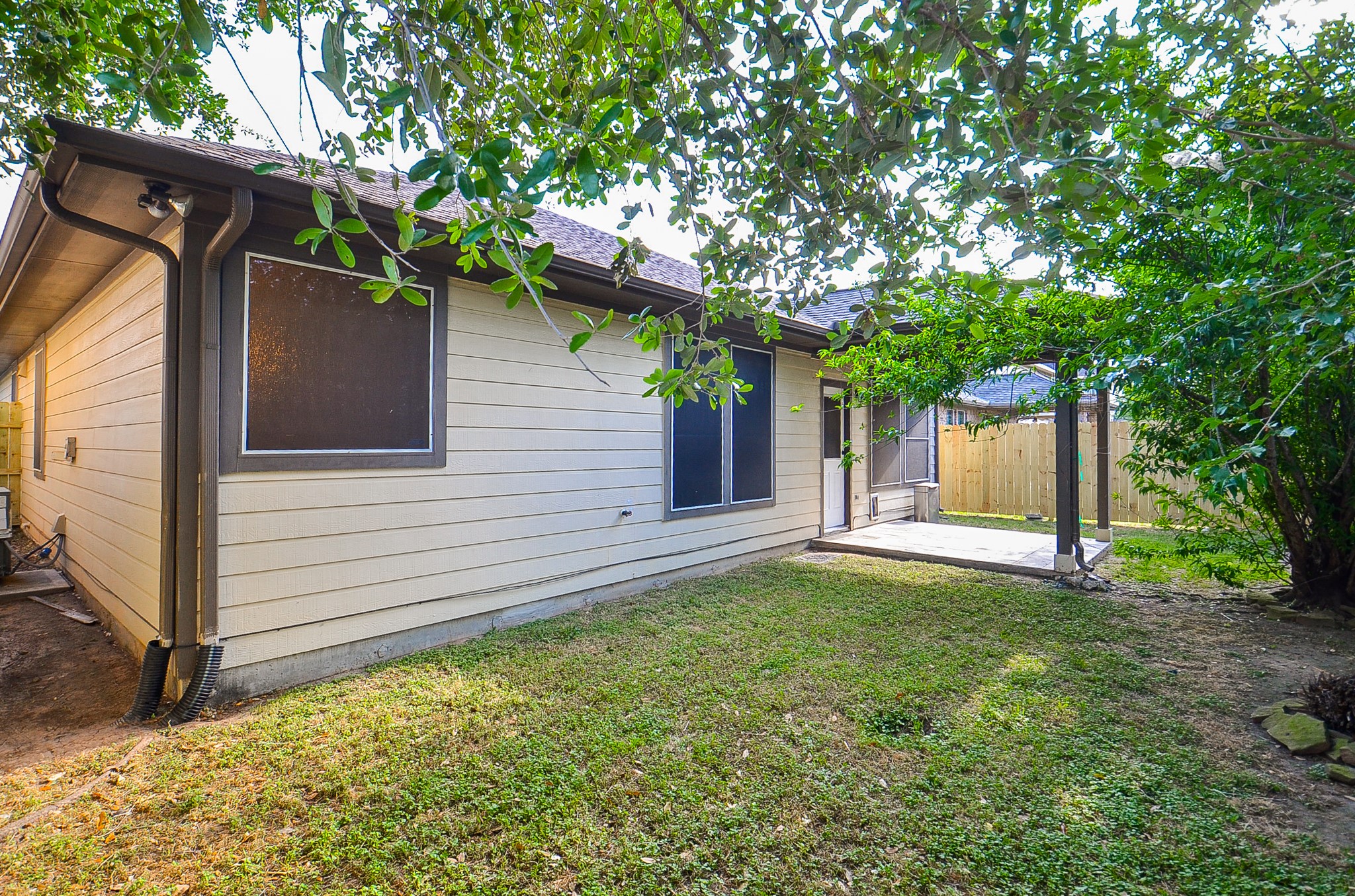 20127 Jasper Oaks Drive Cypress, TX 77433 - Photo 28 of 32 a house that has a tree in front of the house