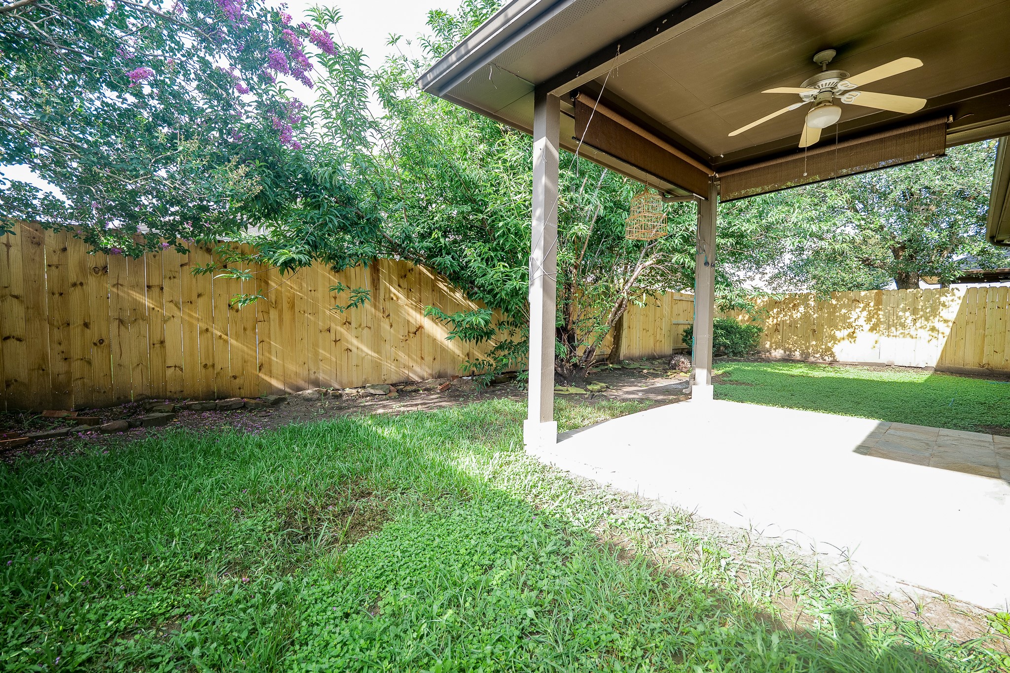 20127 Jasper Oaks Drive Cypress, TX 77433 - Photo 30 of 32 a view of backyard with green space