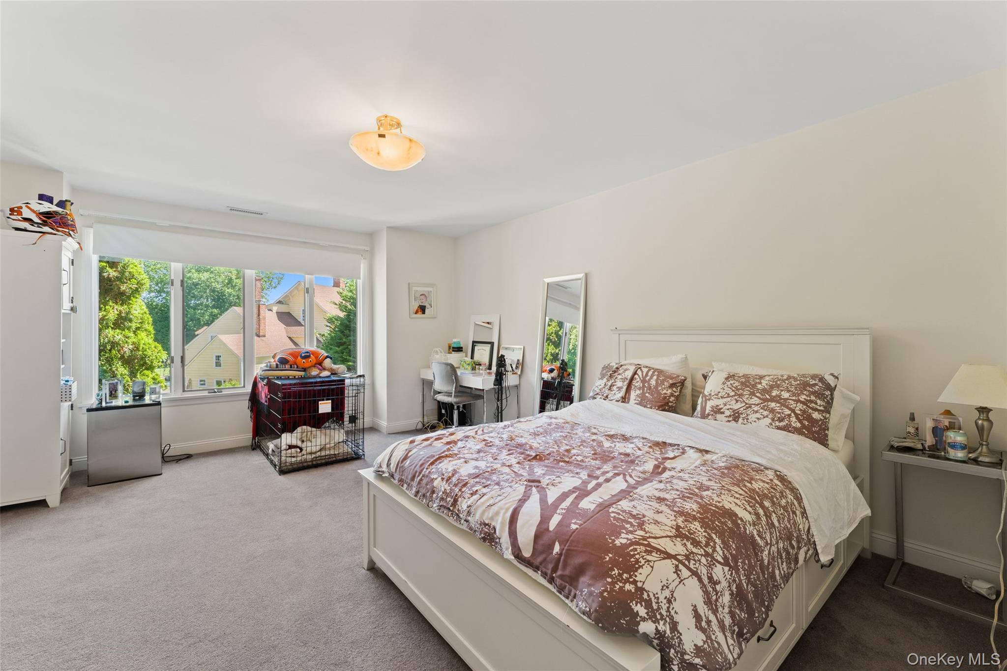 6 Magnetti Circle Mamaroneck, NY 10543 - Photo 15 of 24 a bedroom with a bed and a window