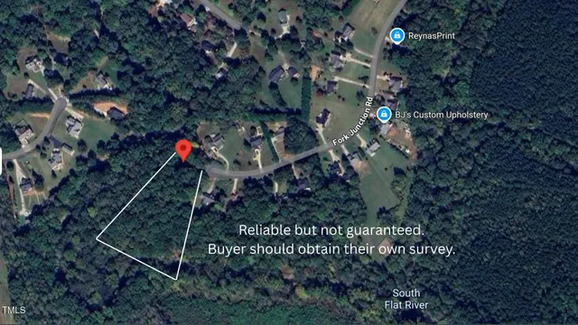 a view of a house with a tree