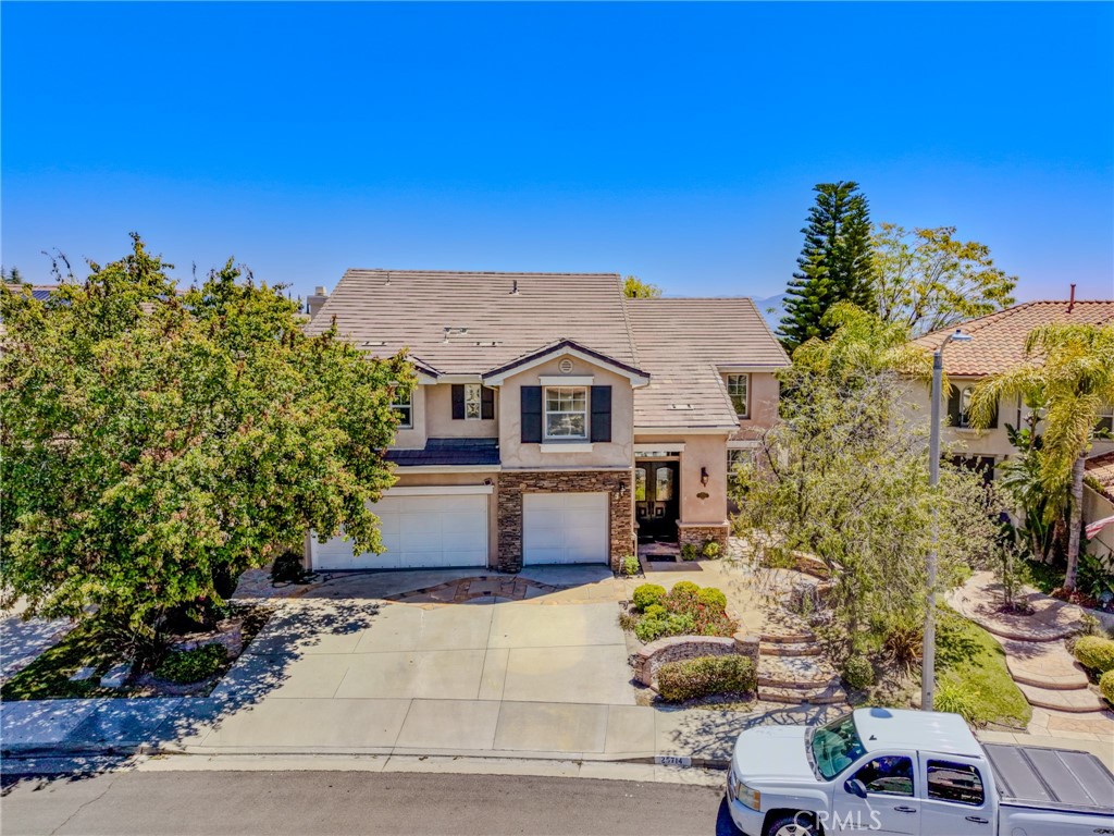 25714 Wallace Place Stevenson Ranch, CA 91381 - Photo 23 of 24 a house view with a outdoor space