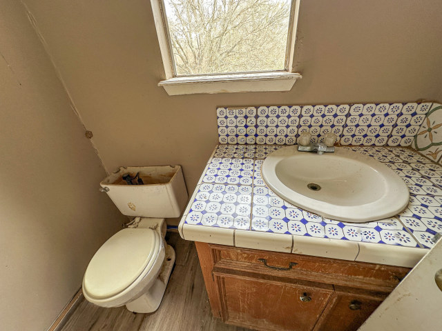 620 Sundown Road Caldwell, TX 77836 - Photo 13 of 15 a bathroom with a toilet and a sink