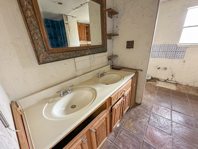 620 Sundown Road Caldwell, TX 77836 - Photo 10 of 15 a bathroom with a sink double vanity