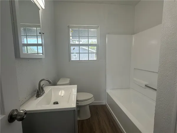 a bathroom with a sink and a toilet