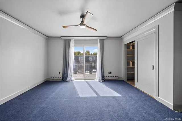 a view of an empty room with window