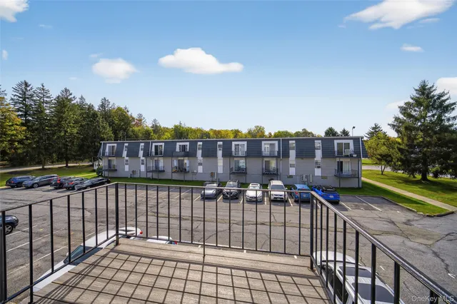 a view of a balcony with city view