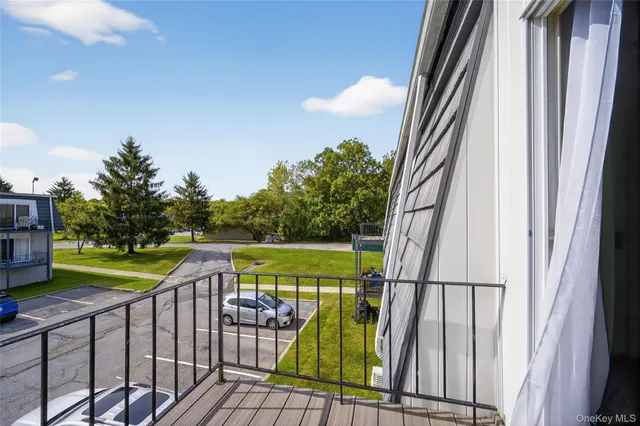 a view of a golf course with a lake