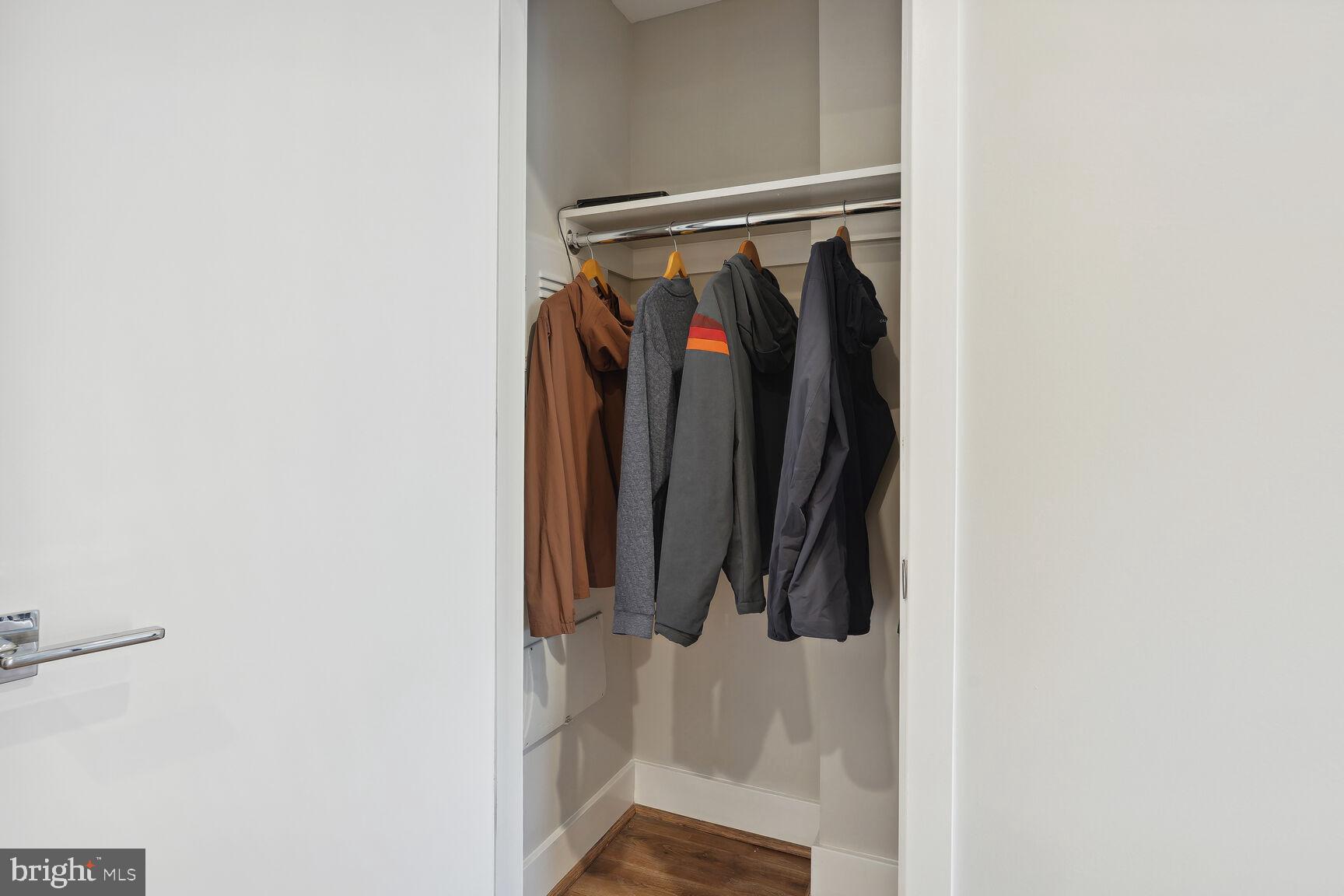 1628 11th Street Northwest, Unit 108 Washington, DC 20001 - Photo 12 of 44 a view of walk in closet with clothes