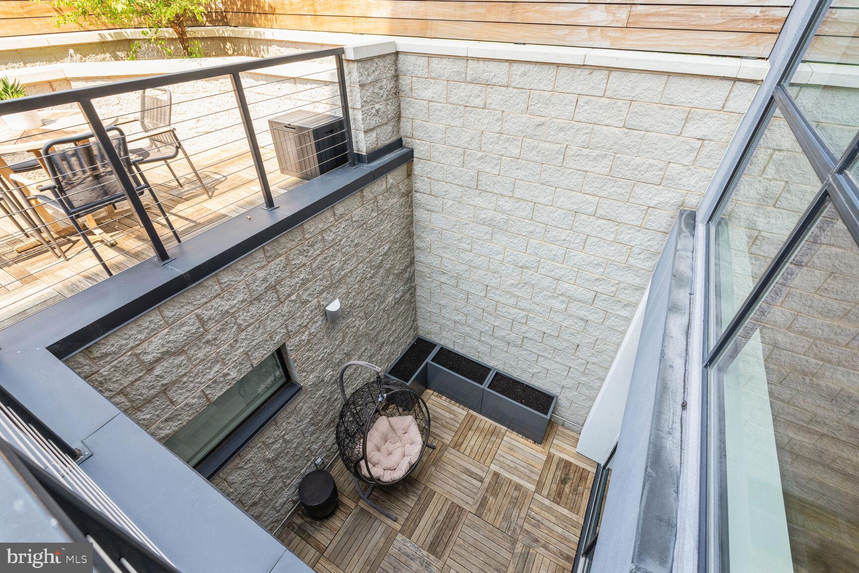 1628 11th Street Northwest, Unit 108 Washington, DC 20001 - Photo 14 of 44 a view of balcony with furniture