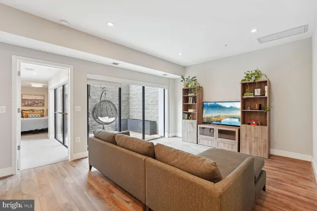 a living room with furniture and a gate