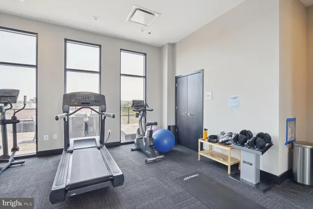 a view of roof deck with patio