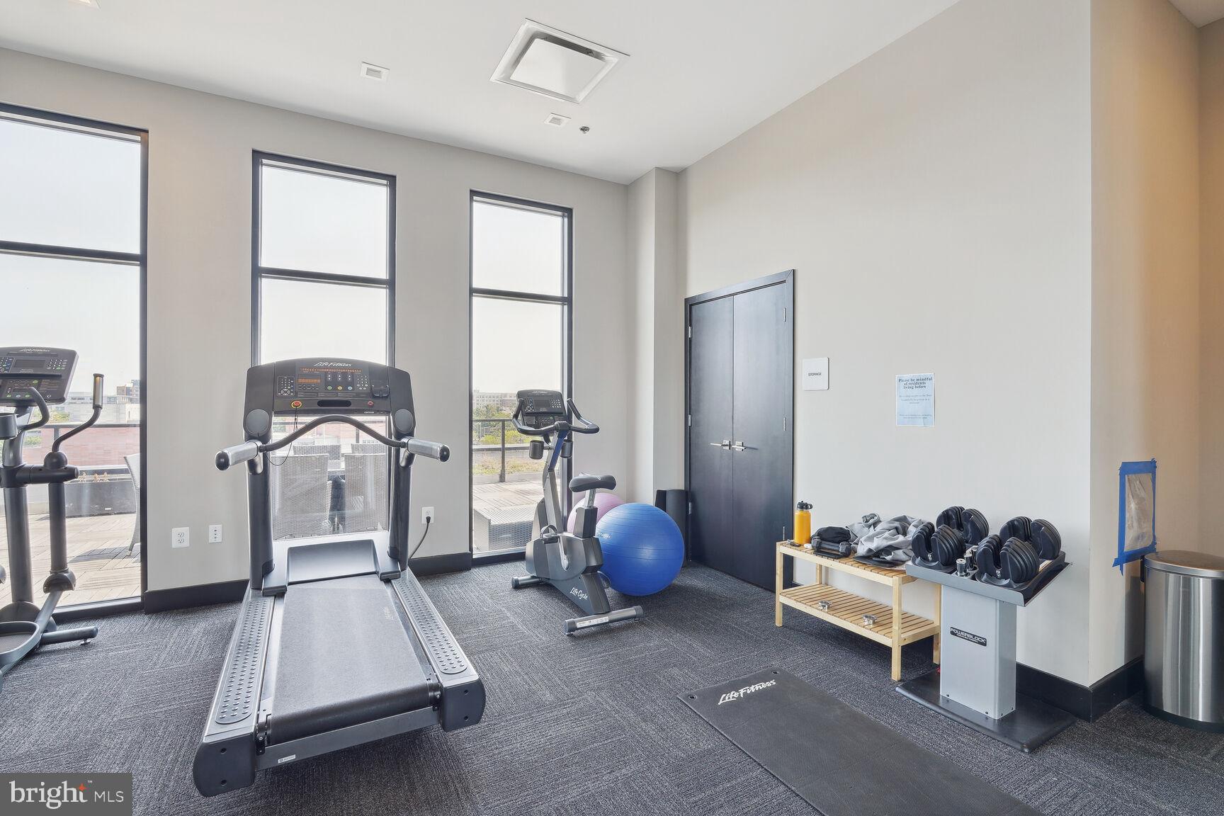 1628 11th Street Northwest, Unit 108 Washington, DC 20001 - Photo 33 of 44 a room with gym equipment and a window