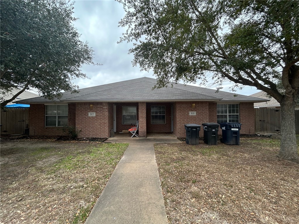 919 Sun Meadows Street College Station, TX 77845 - Photo 1 of 1 a view of a house with large trees and a large tree