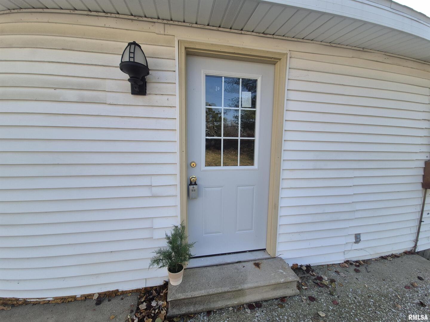 802 Dillard Street Eldorado, IL 62930 - Photo 23 of 28 a view of a door and a window