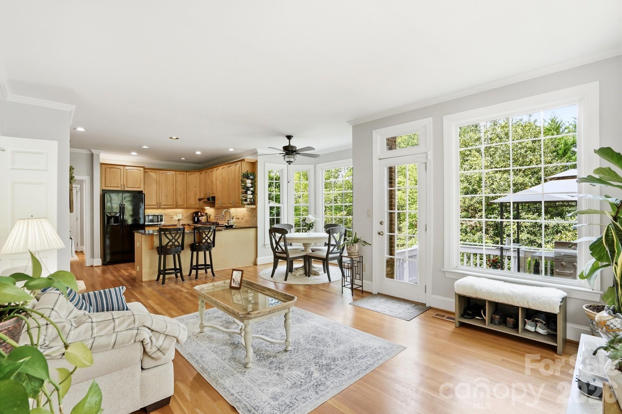 11078 Deep Cove Drive Tega Cay, SC 29708 - Photo 14 of 46 a living room with furniture and a large window