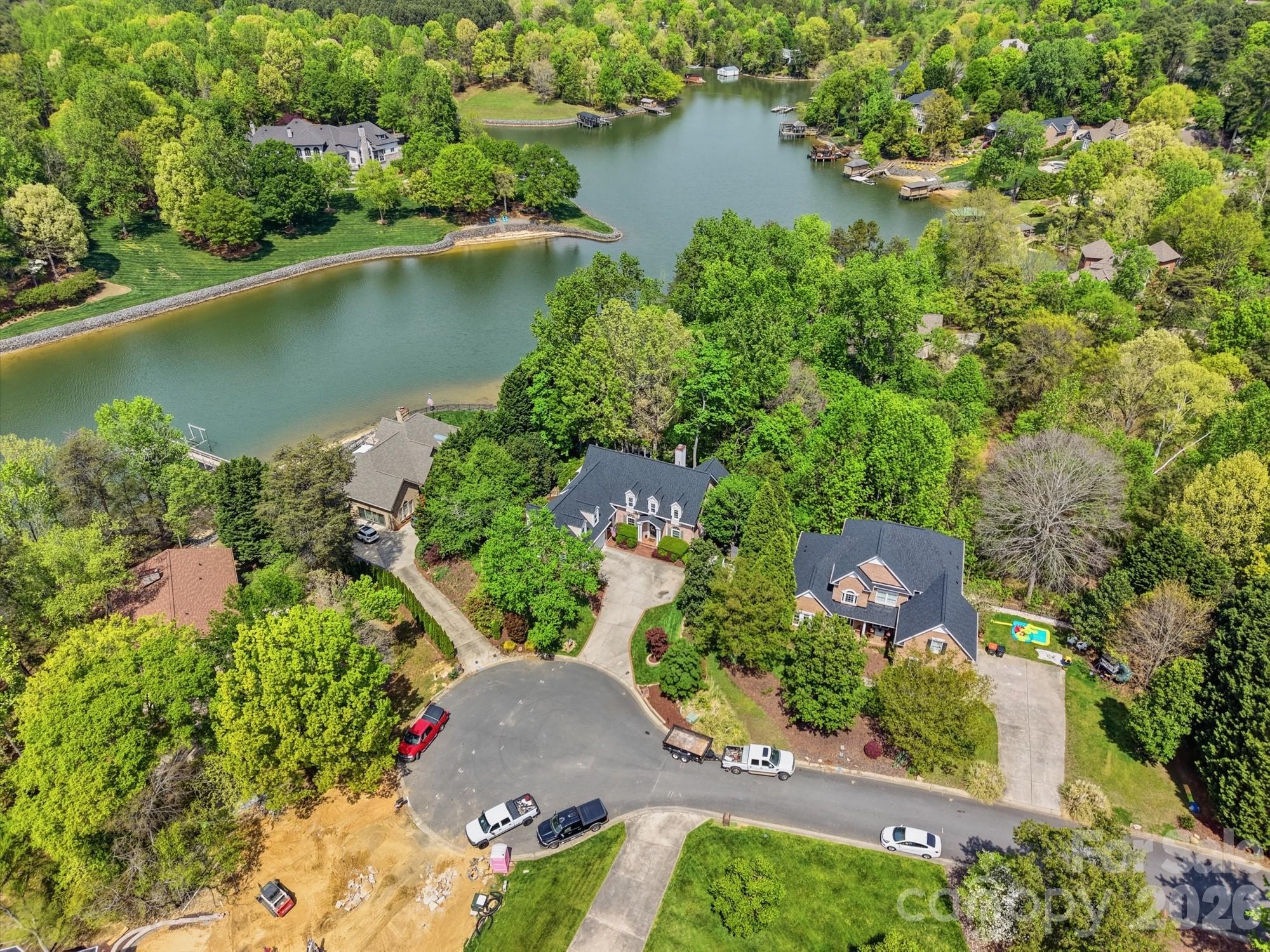 11078 Deep Cove Drive Tega Cay, SC 29708 - Photo 2 of 46 an aerial view of residential house with outdoor space and lake view