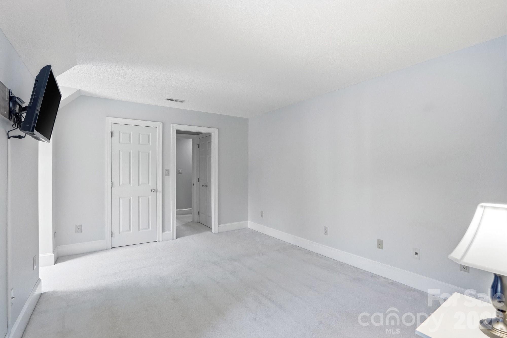 11078 Deep Cove Drive Tega Cay, SC 29708 - Photo 28 of 46 a view of empty room with a window