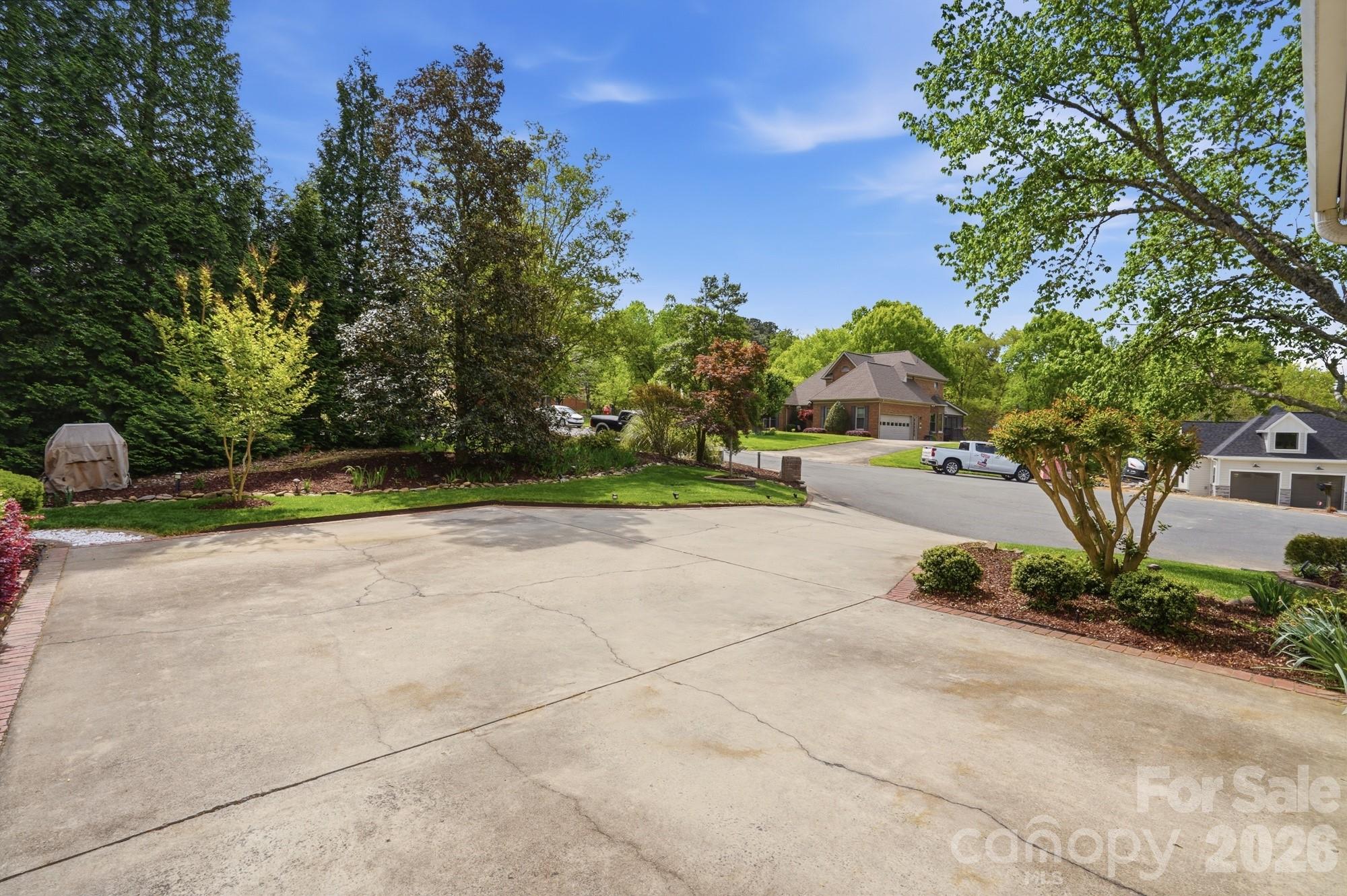 11078 Deep Cove Drive Tega Cay, SC 29708 - Photo 6 of 46 a view of a park with plants and trees