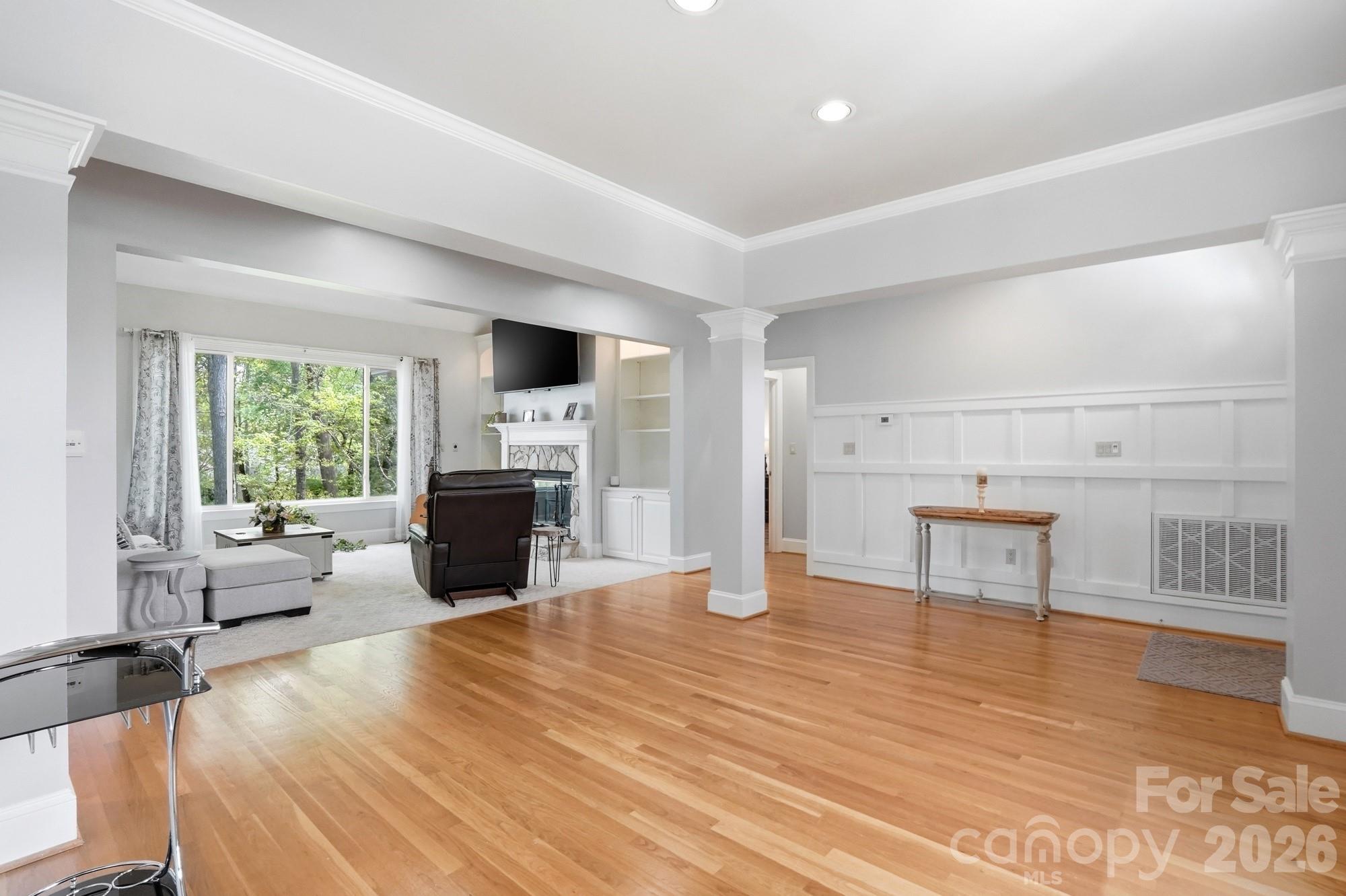 11078 Deep Cove Drive Tega Cay, SC 29708 - Photo 8 of 46 a living room with furniture and a fireplace